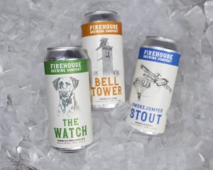 Cans of Firehouse Brewing Company The Watch, Bell Tower, and Smokejumper Stout beers